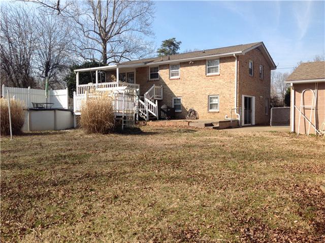1202 Randy Road Ashland City, TN 37015 - Photo 2 of 19 View from the back yard. Lots of patio, covered porch, pool & deck.
