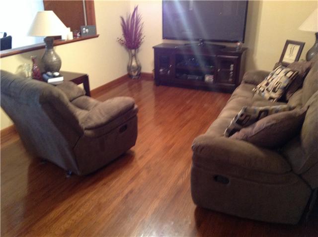1202 Randy Road Ashland City, TN 37015 - Photo 3 of 19 Seller had floors professionally refinished. Open feel to living room.