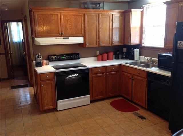 1202 Randy Road Ashland City, TN 37015 - Photo 6 of 19 Cute kitchen with solid oak cabinets.