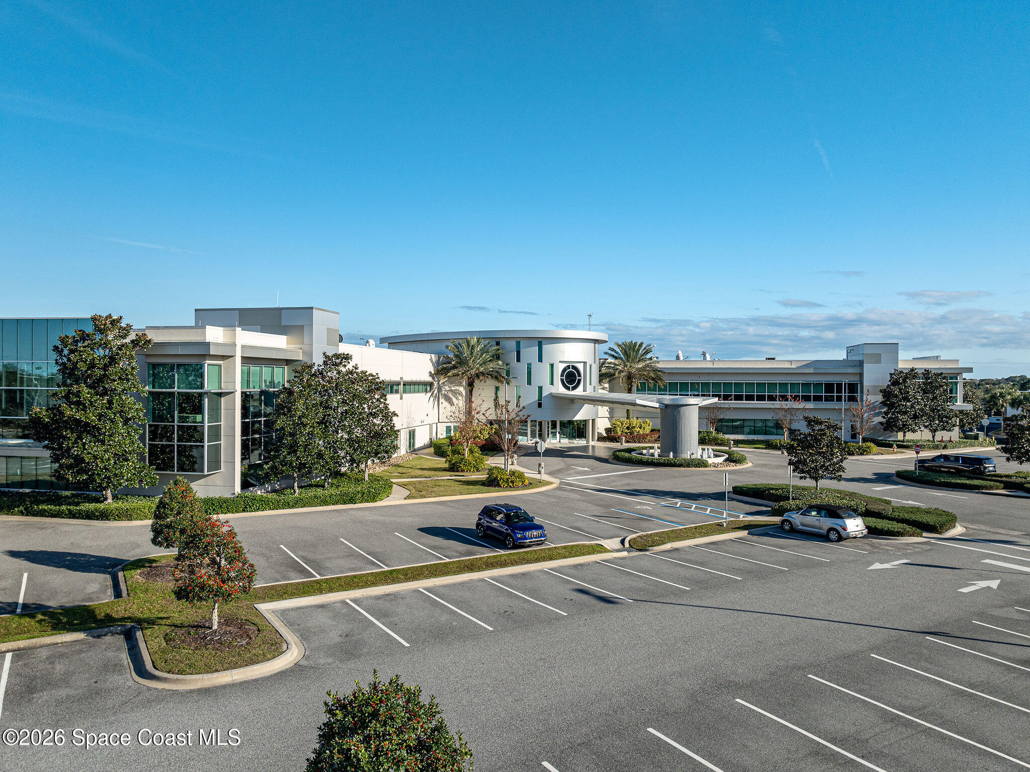 8615-8635 Holiday Springs Road Rockledge, FL 32955 - Photo 11 of 13 a city view with tall buildings