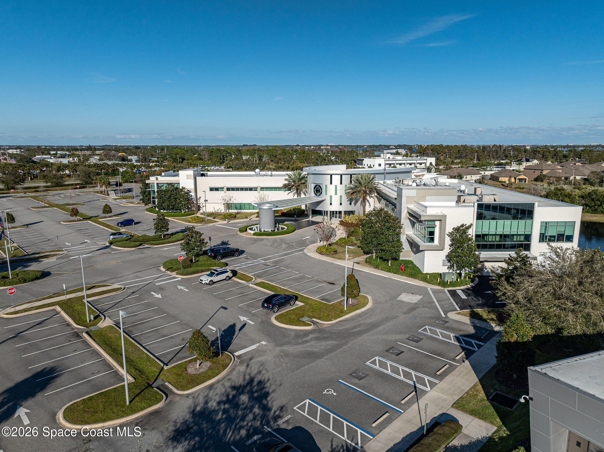8615-8635 Holiday Springs Road Rockledge, FL 32955 - Photo 12 of 13 an aerial view of residential houses with outdoor space