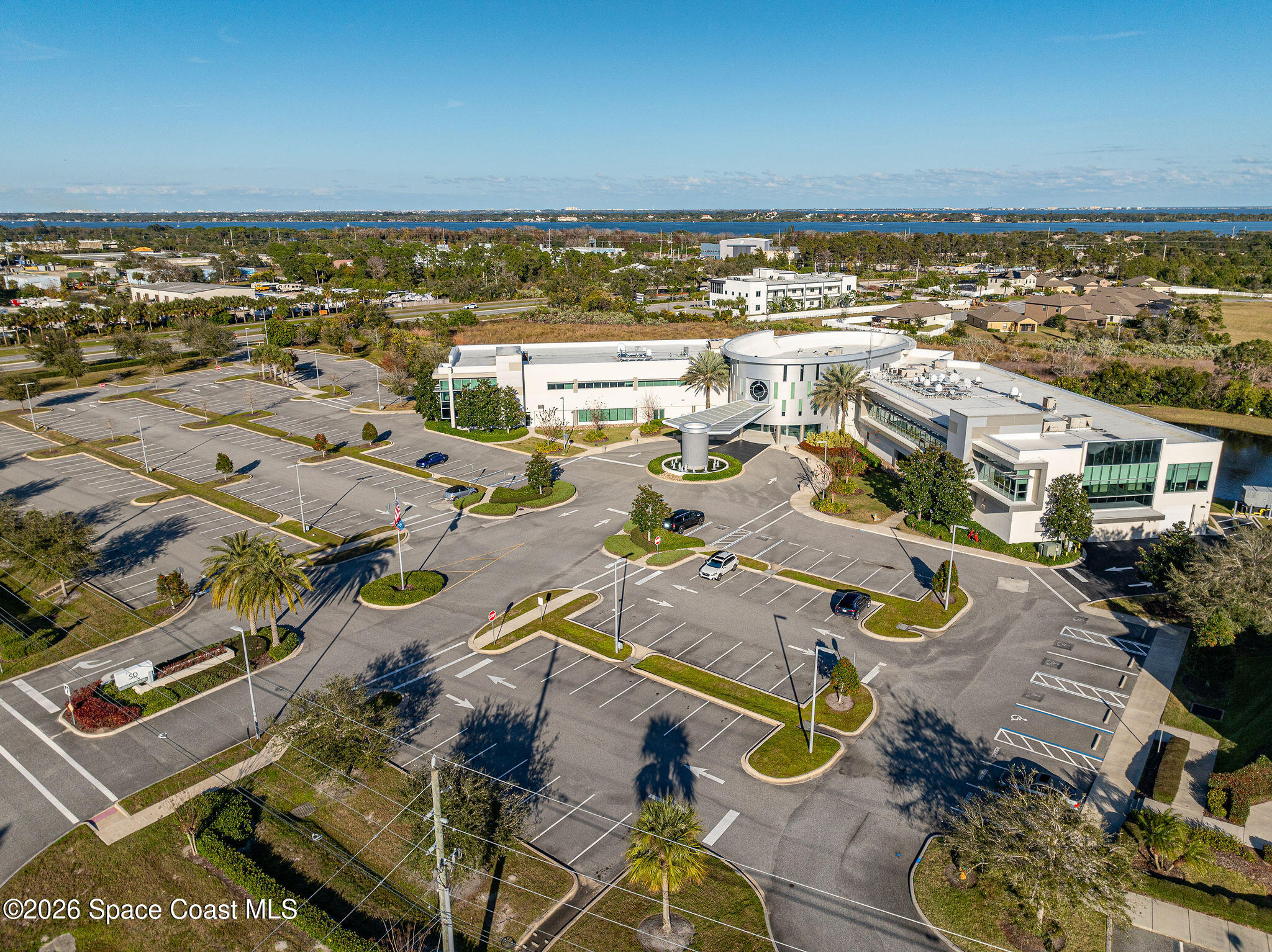 8615-8635 Holiday Springs Road Rockledge, FL 32955 - Photo 10 of 13 an aerial view of residential building with outdoor space