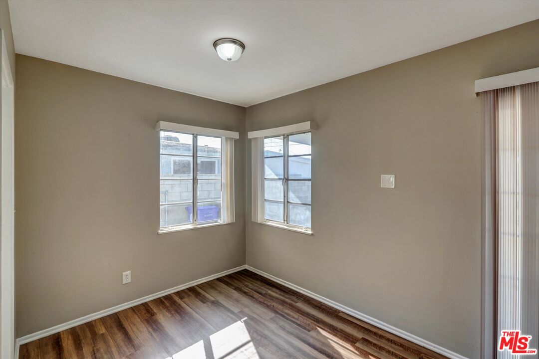 17377 Fairview Road Fontana, CA 92336 - Photo 15 of 39 a view of an empty room with a window