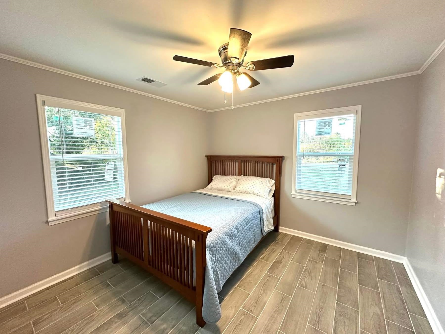 2003 Bond Ferry Road Brownsville, TN 38012 - Photo 14 of 21 Bedroom with wood finish floors, ornamental molding, and ceiling fan