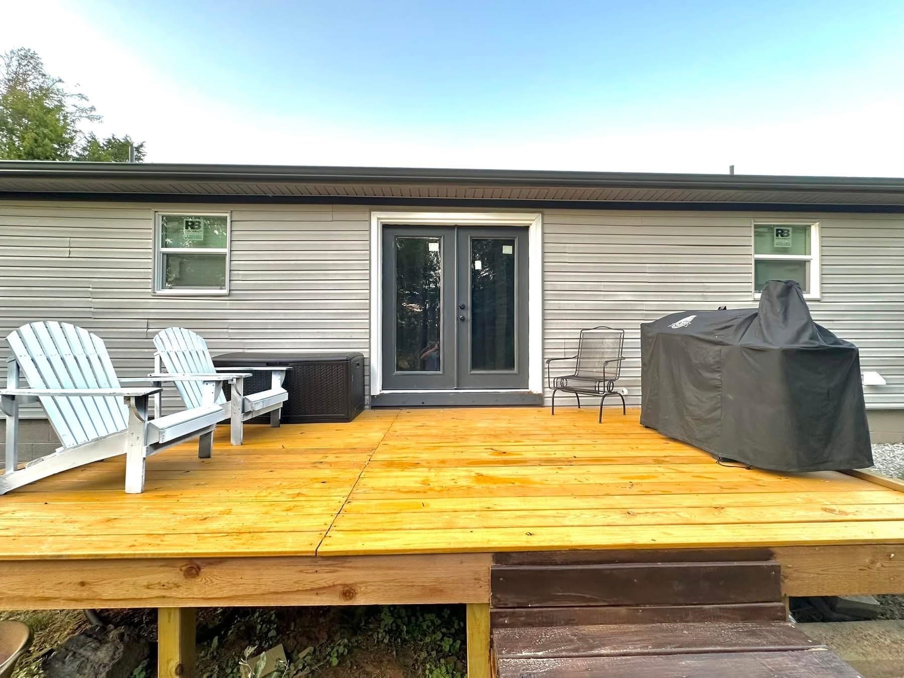 2003 Bond Ferry Road Brownsville, TN 38012 - Photo 20 of 21 Deck featuring a grill and french doors