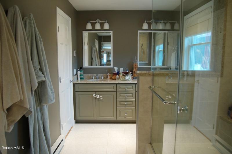 204 Bunce Road South Sheffield, MA 01222 - Photo 13 of 26 a bathroom with a sink a mirror and a shower
