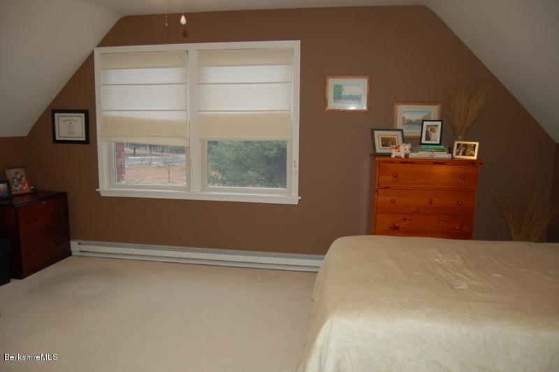 204 Bunce Road South Sheffield, MA 01222 - Photo 16 of 26 a bedroom with a bed and a window