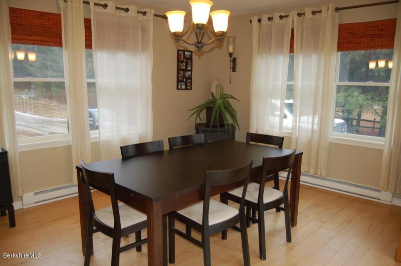 204 Bunce Road South Sheffield, MA 01222 - Photo 6 of 26 a dining room with furniture and wooden floor