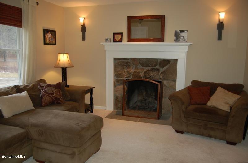 204 Bunce Road South Sheffield, MA 01222 - Photo 9 of 26 a living room with furniture and a fireplace