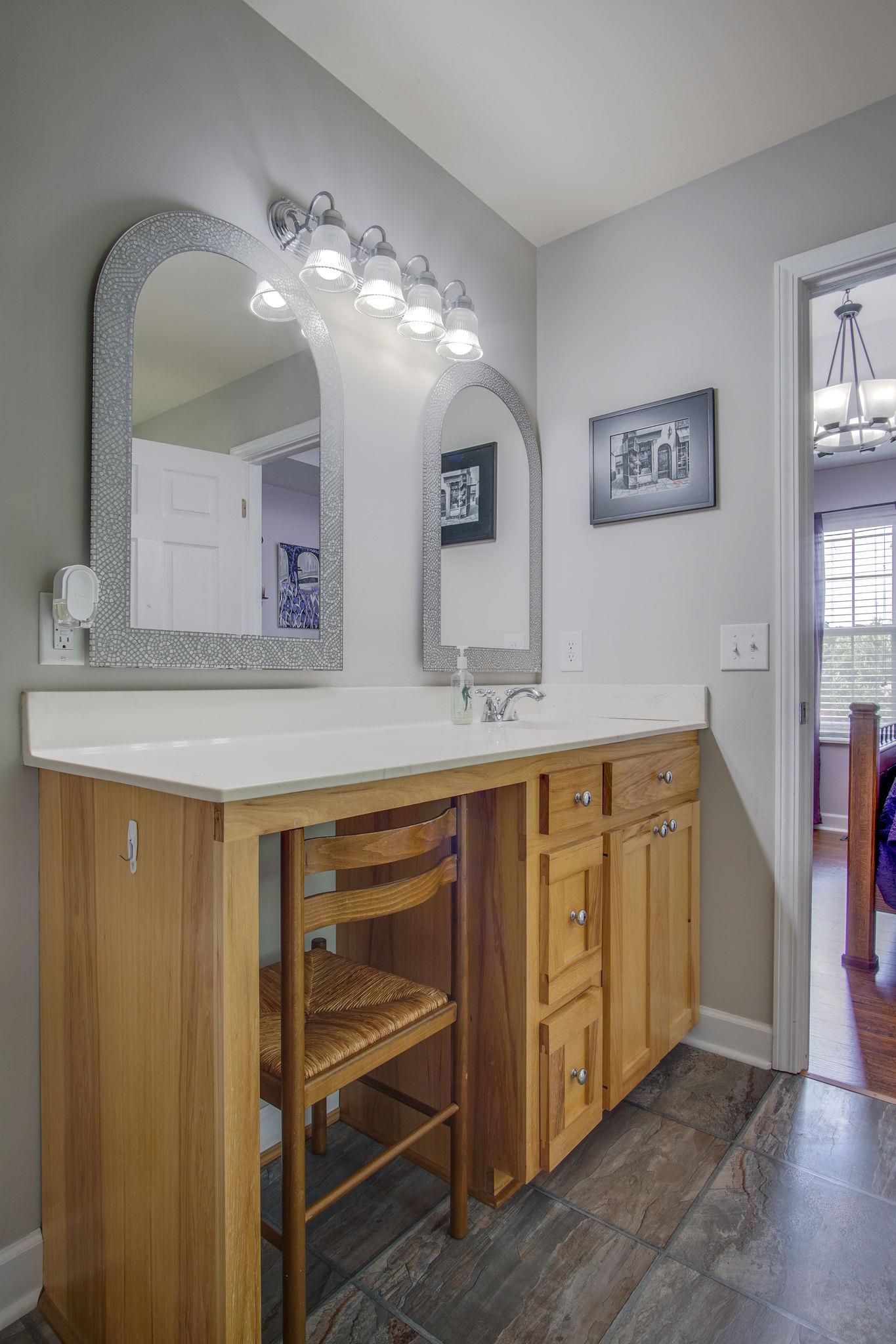 1674 Eno Road Dickson, TN 37055 - Photo 19 of 28 a spacious bathroom with a double vanity sink and a mirror