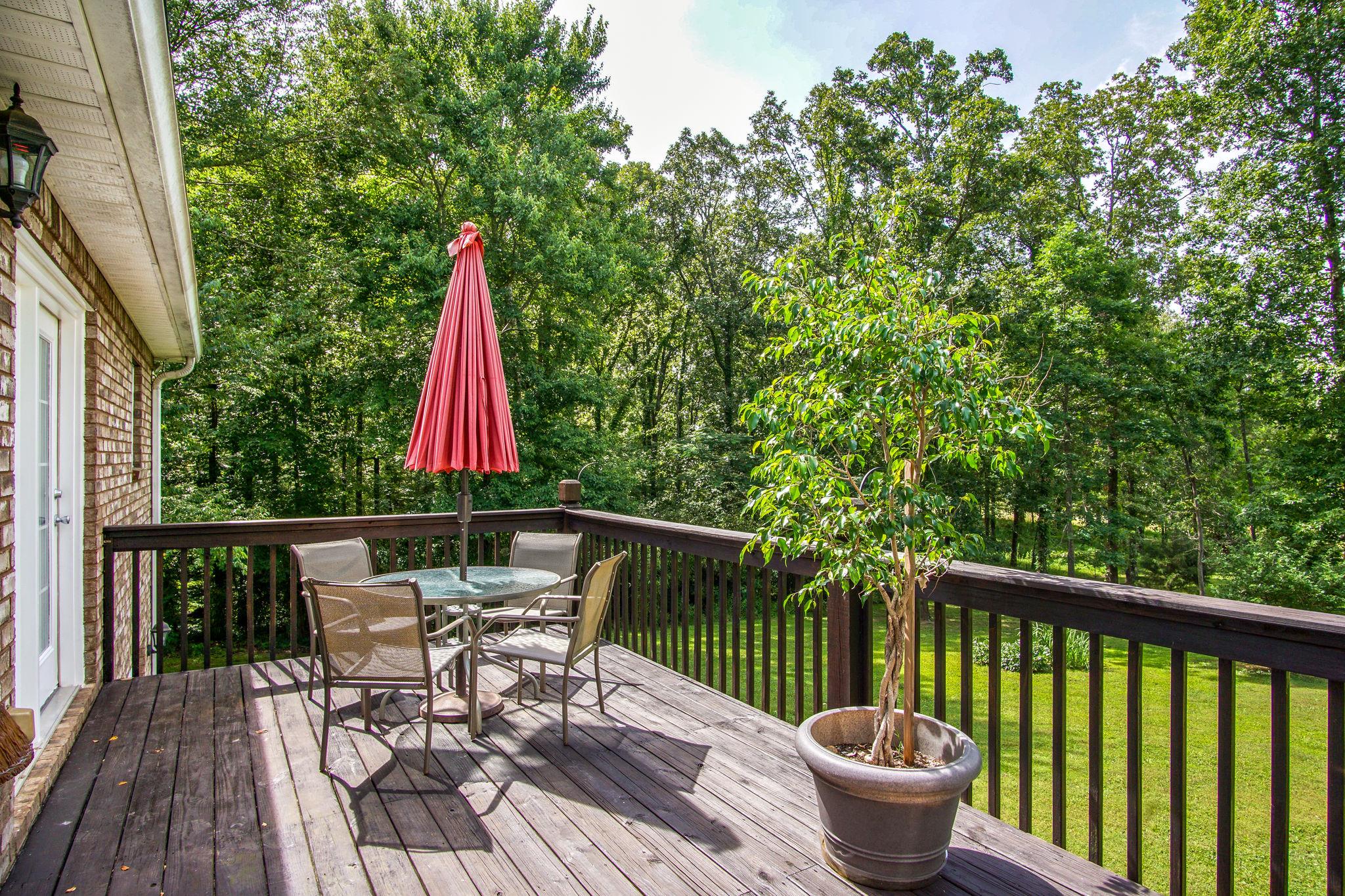1674 Eno Road Dickson, TN 37055 - Photo 4 of 28 a view of a two chairs and table in the balcony