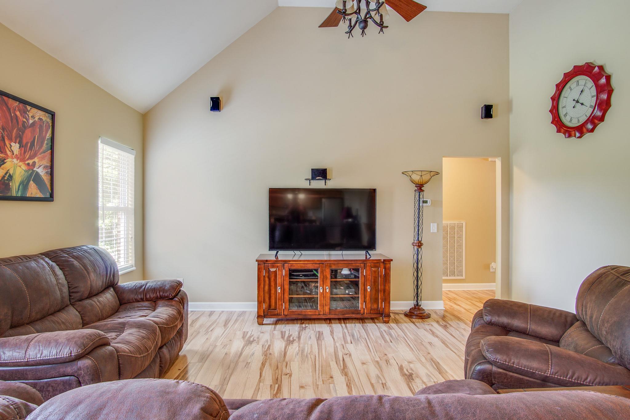 1674 Eno Road Dickson, TN 37055 - Photo 6 of 28 a living room with furniture and a flat screen tv