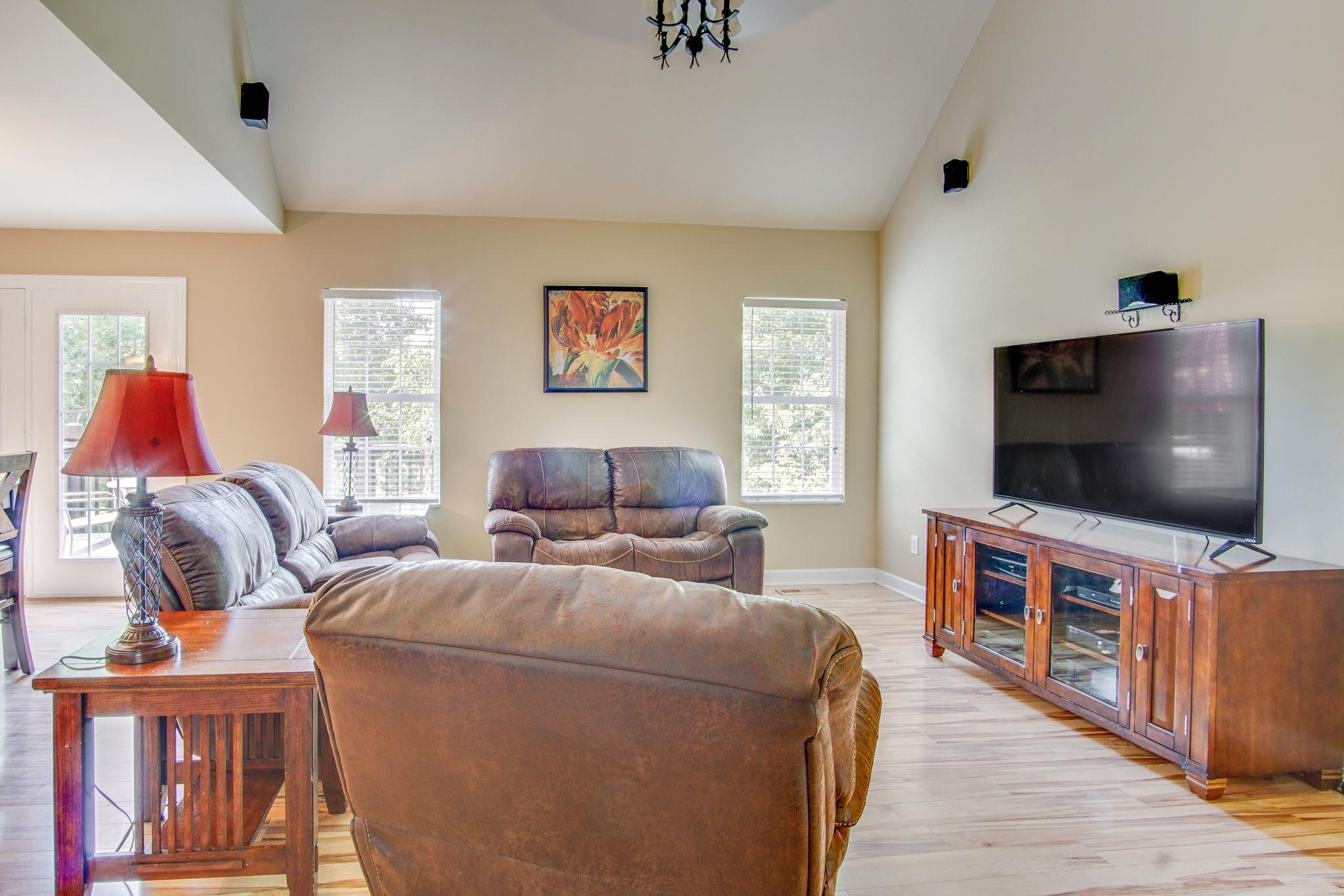 1674 Eno Road Dickson, TN 37055 - Photo 7 of 28 a living room with furniture and a flat screen tv