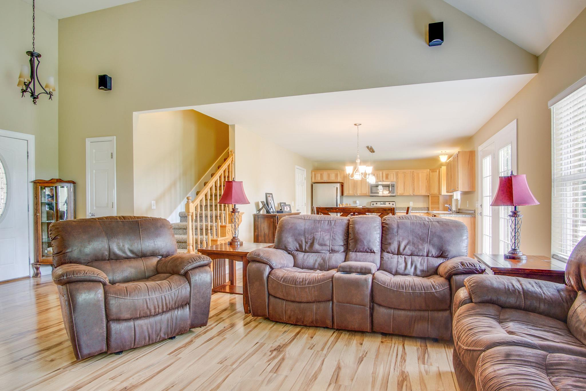 1674 Eno Road Dickson, TN 37055 - Photo 28 of 28 a living room with furniture and a couch