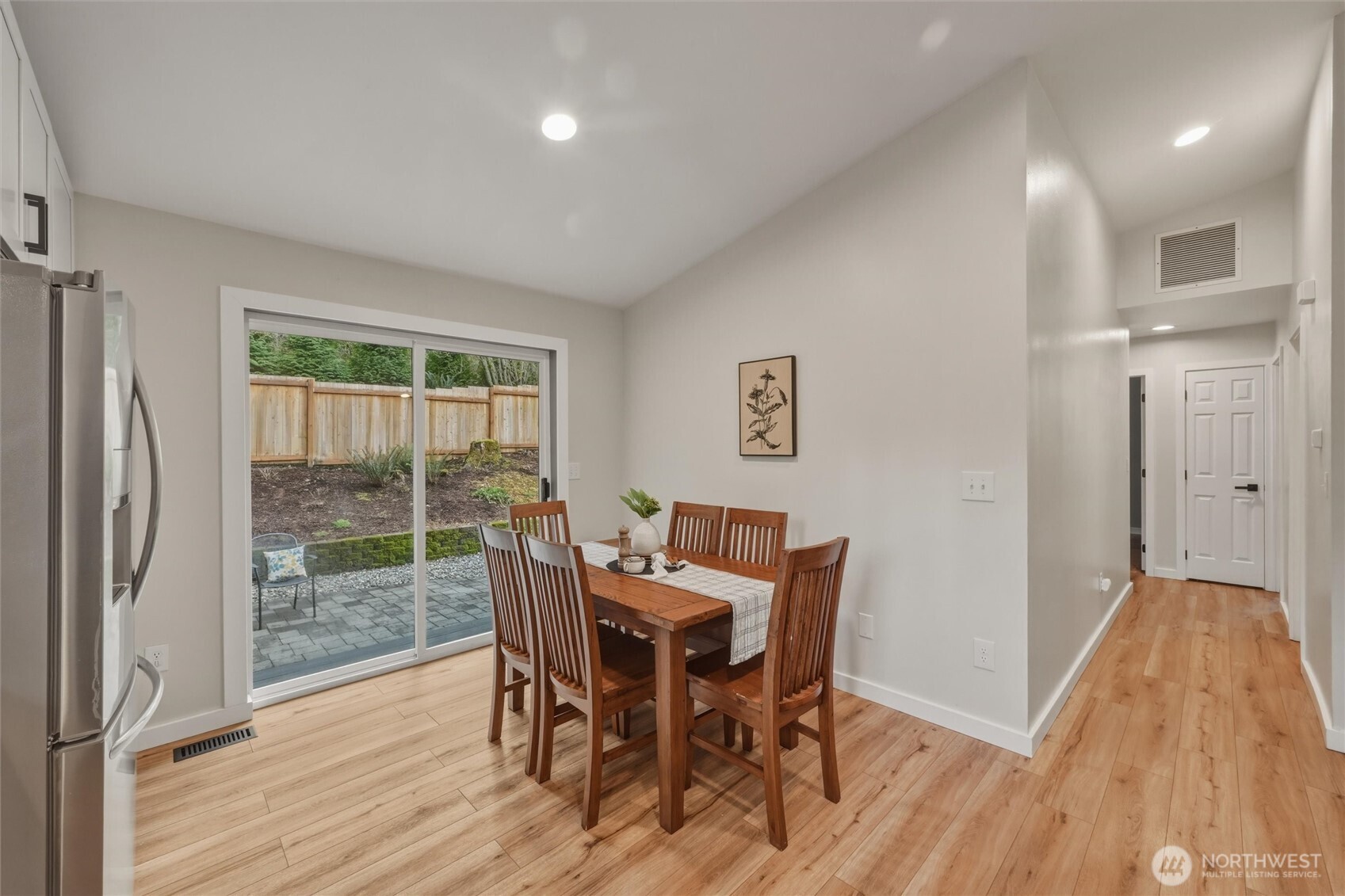 9 Sunnyside Lane Bellingham, WA 98229 - Photo 18 of 39 a view of a dining room with furniture and wooden floor