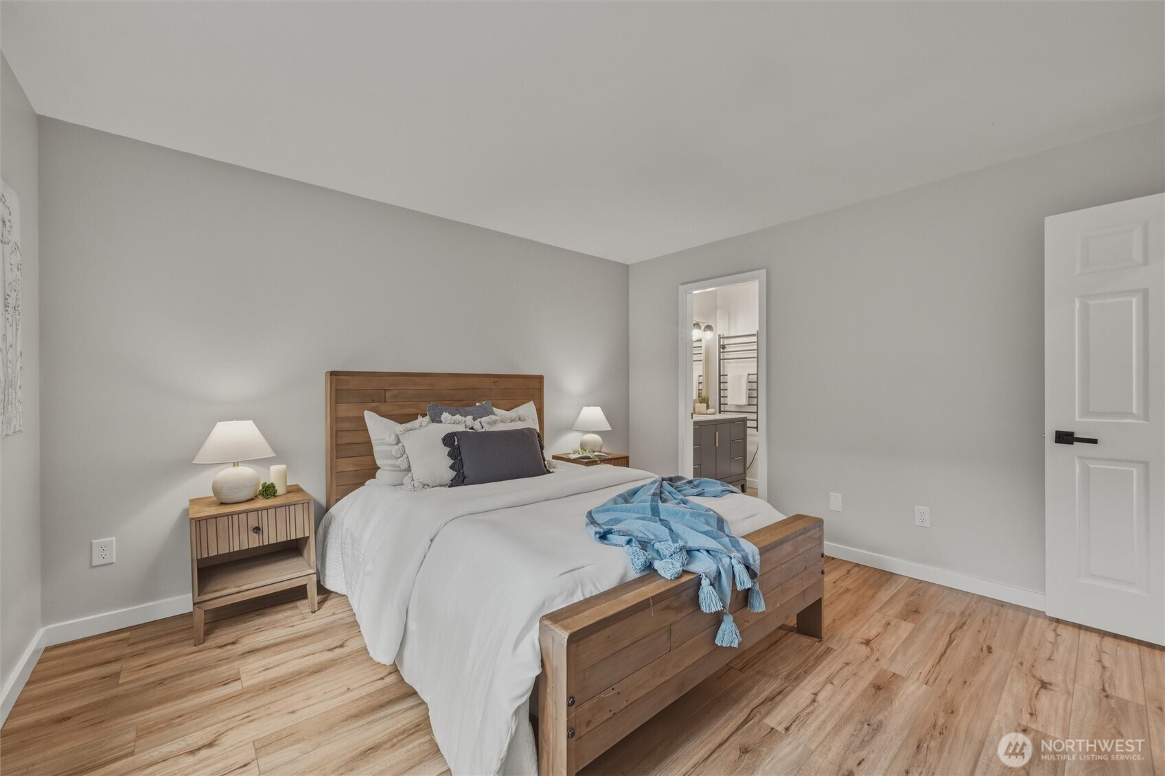 9 Sunnyside Lane Bellingham, WA 98229 - Photo 20 of 39 a bedroom with a bed and wooden floor