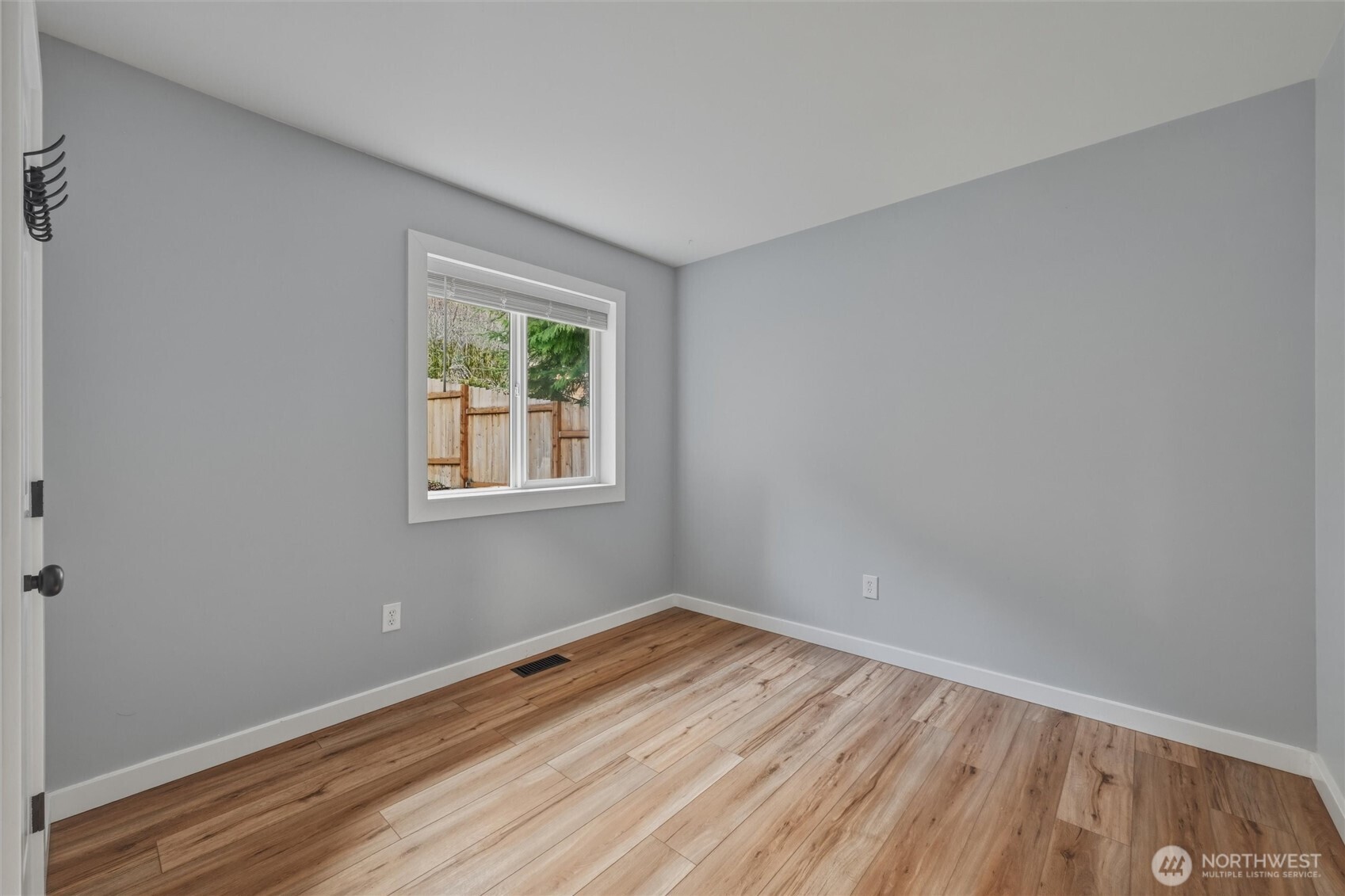 9 Sunnyside Lane Bellingham, WA 98229 - Photo 28 of 39 a view of empty room with wooden floor and fan