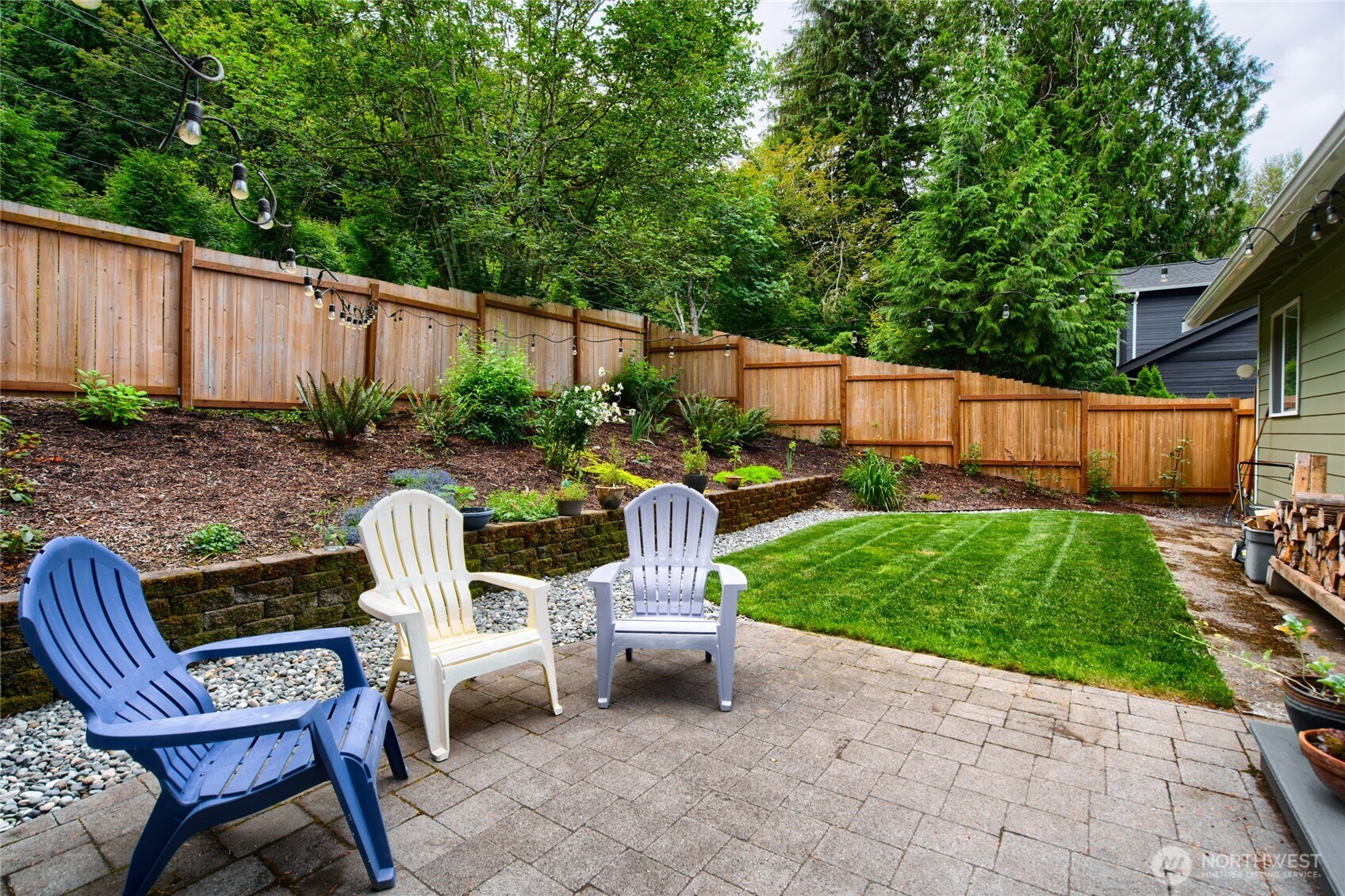 9 Sunnyside Lane Bellingham, WA 98229 - Photo 3 of 39 a view of a chair and table in backyard