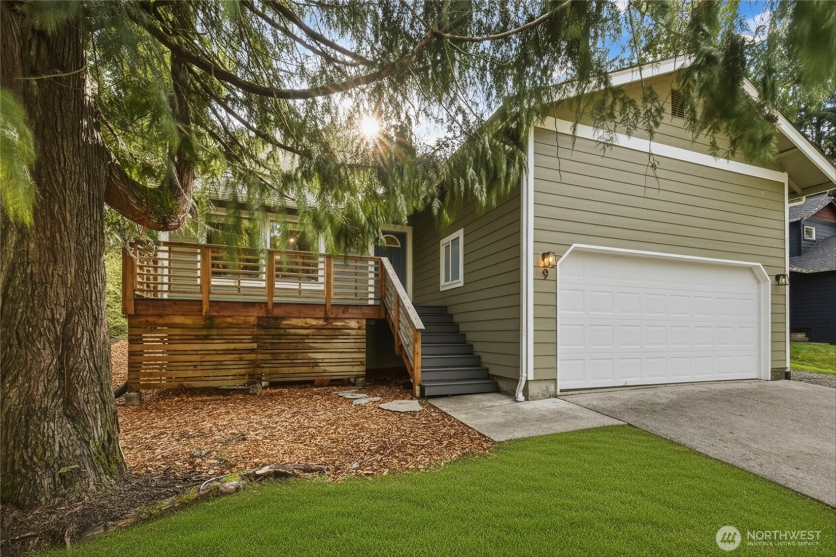 9 Sunnyside Lane Bellingham, WA 98229 - Photo 32 of 39 a view of a backyard with a tree