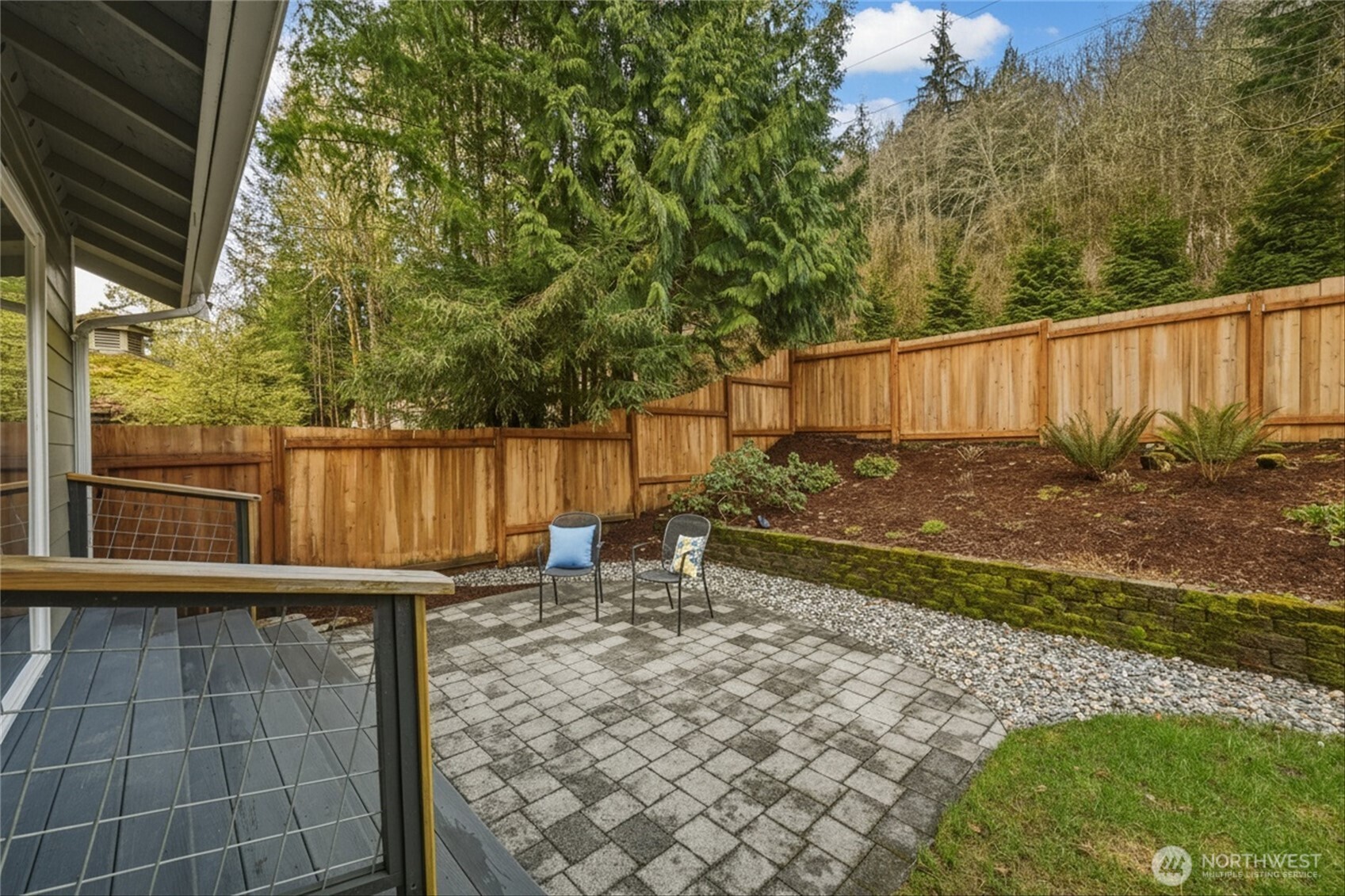 9 Sunnyside Lane Bellingham, WA 98229 - Photo 33 of 39 a view of a backyard with wooden fence and a bench