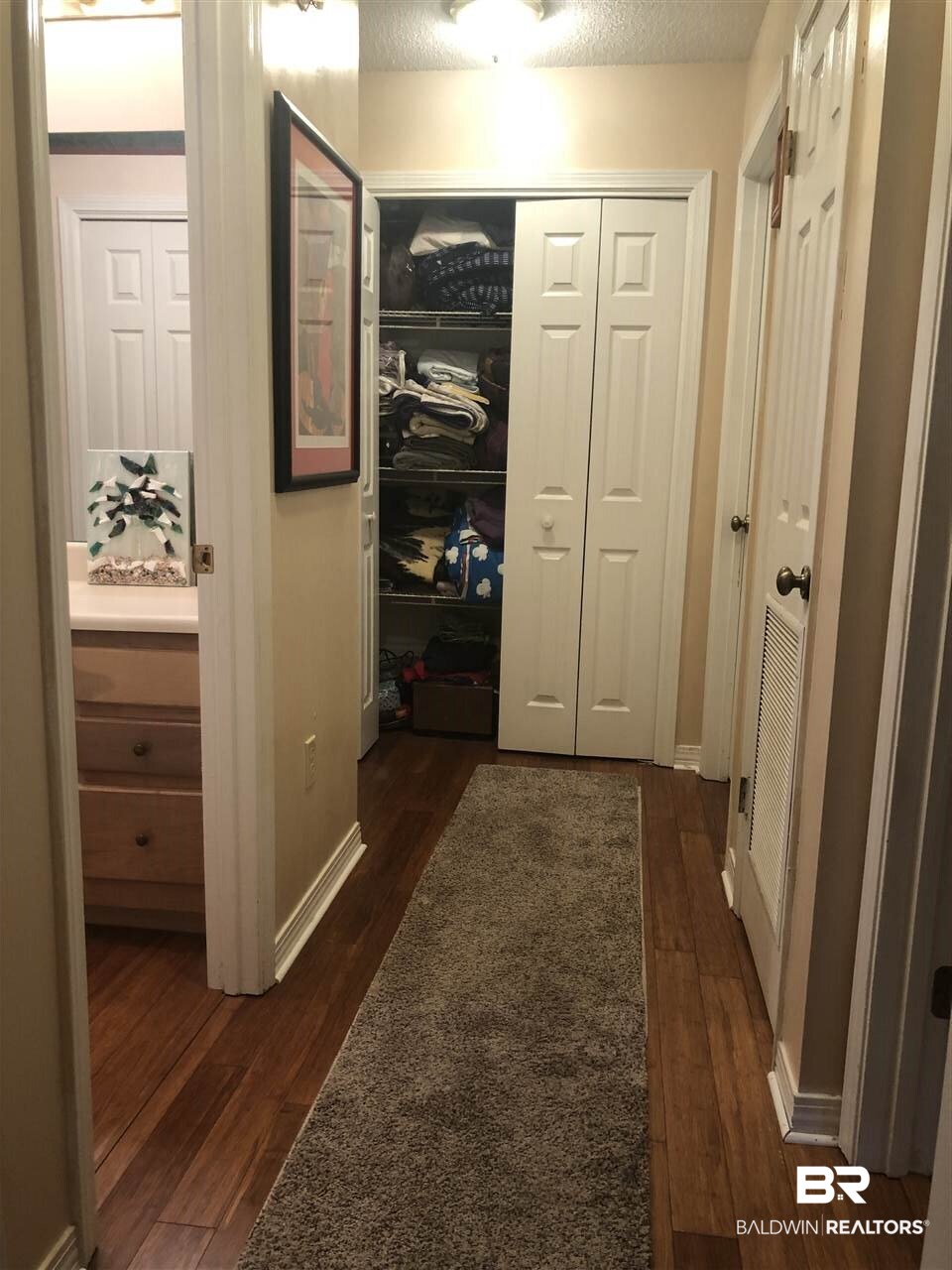 9300 Clubhouse Drive Foley, AL 36535 - Photo 19 of 26 HALLWAY AND LINEN CLOSET