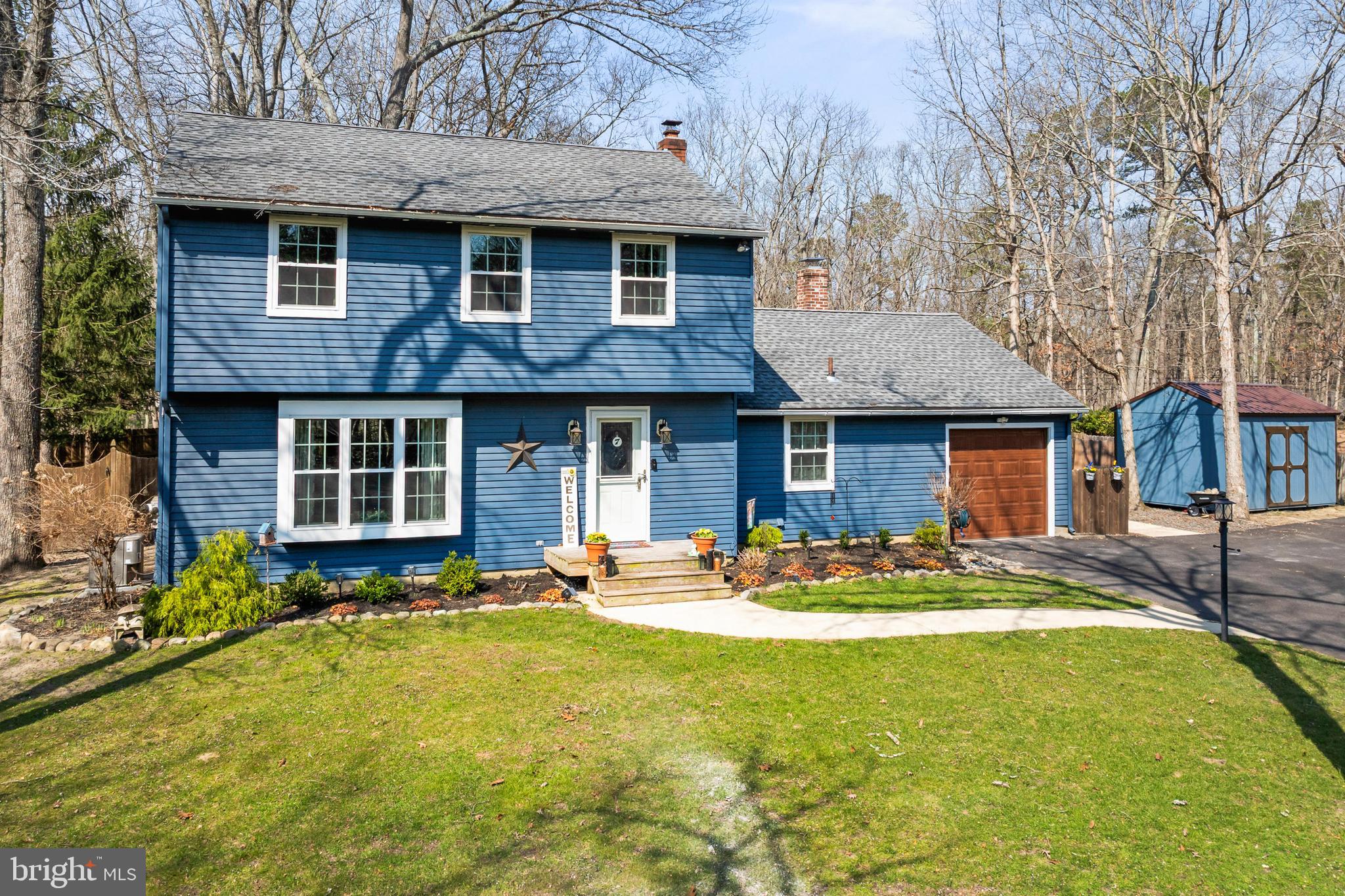 7 Wicklow Drive Tabernacle, NJ 08088 - Photo 1 of 1 a front view of a house with sitting area and garden