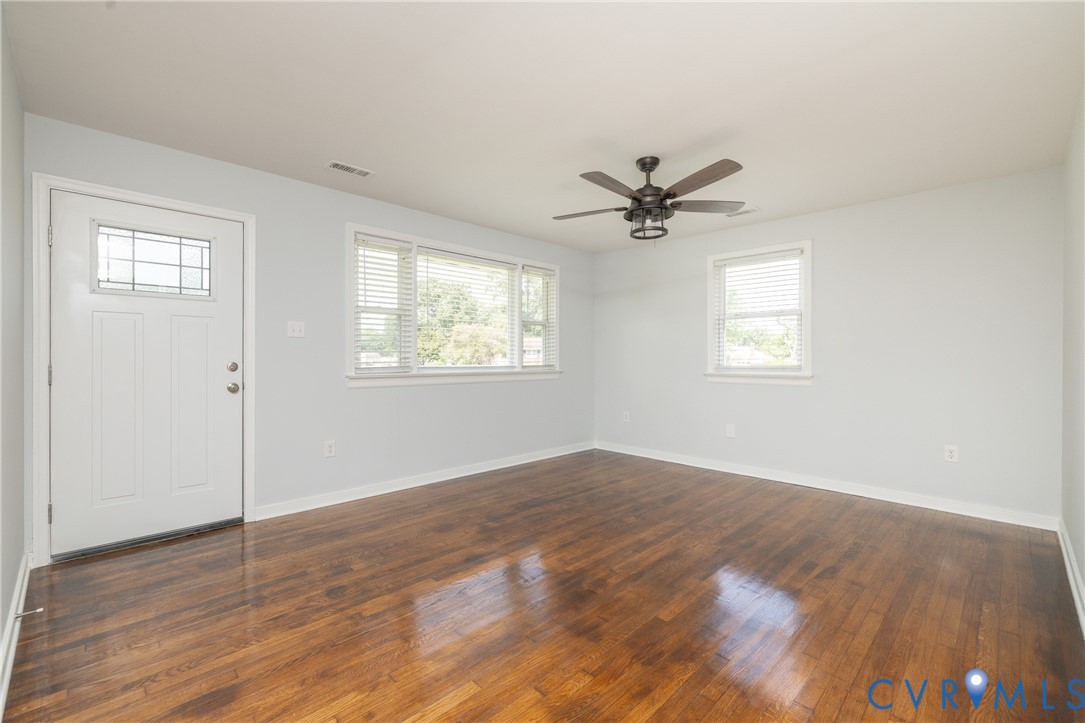 9825 Proctors Road Richmond, VA 23237 - Photo 3 of 20 Living Room with hardwood floors and ceiling fan