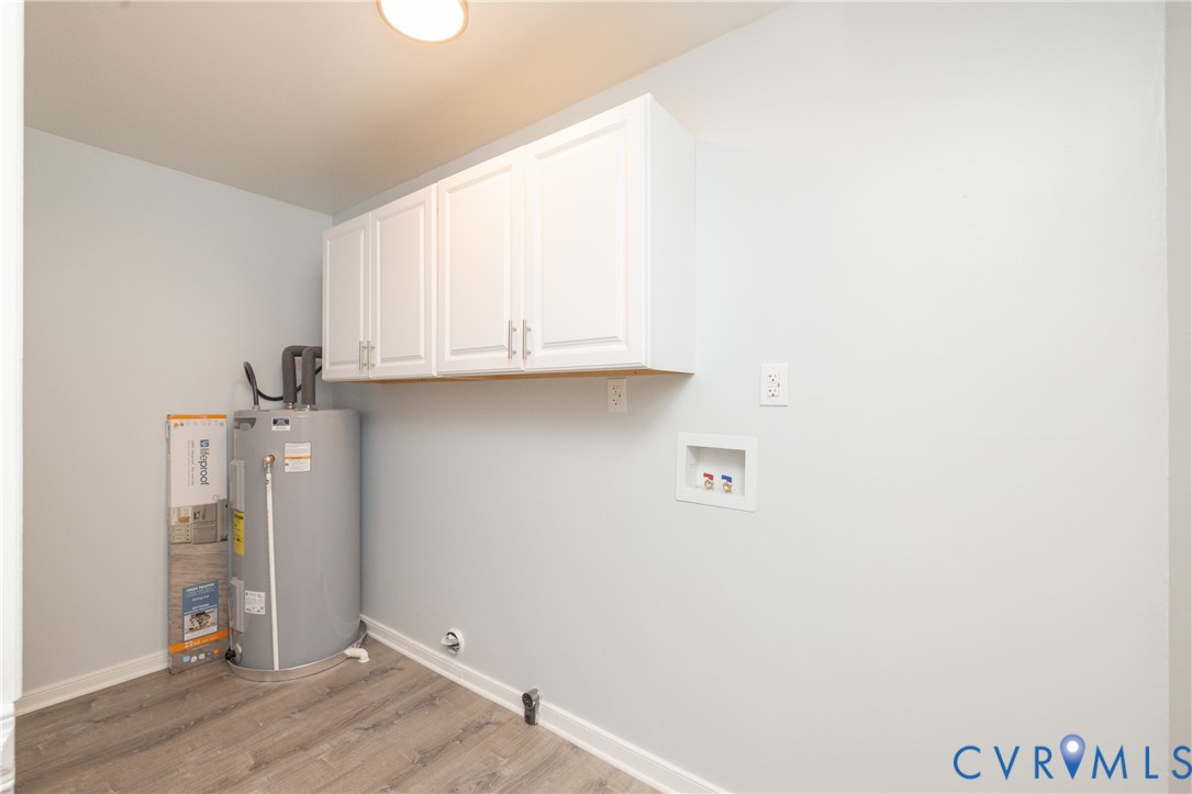 9825 Proctors Road Richmond, VA 23237 - Photo 8 of 20 Washroom with washer hookup, cabinet space, light