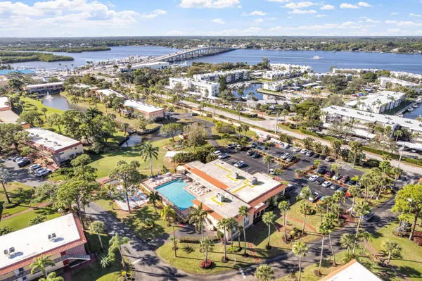an aerial view of residential building with parking space