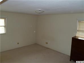1122 Kendrick Road Gastonia, NC 28056 - Photo 5 of 7 an empty room with a window