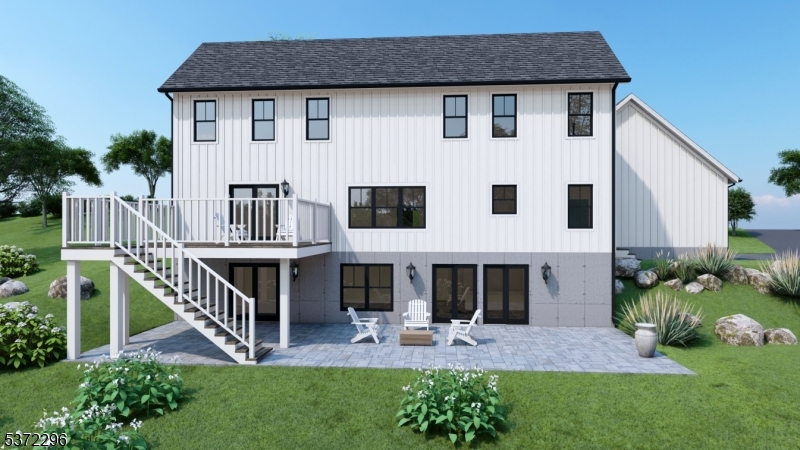 184 Hickory Tavern Road Gillette, NJ 07933 - Photo 4 of 5 a front view of a house with a yard table and chairs