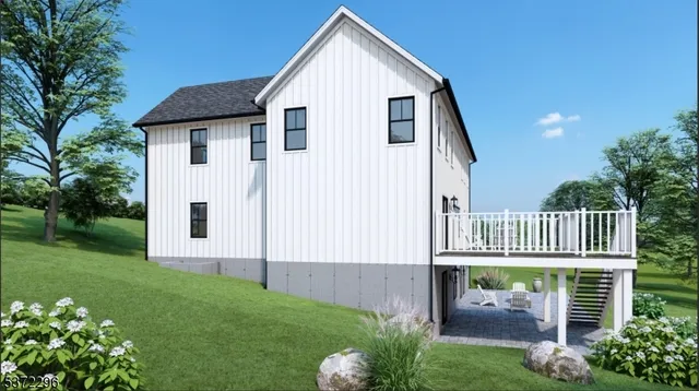 a view of a house with backyard and garden