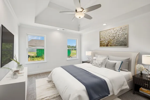a view of a livingroom with a ceiling fan