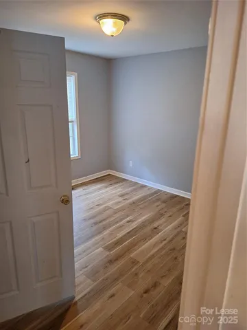 a bathroom with a toilet a sink and shower
