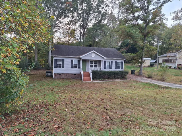 a house view with a garden space