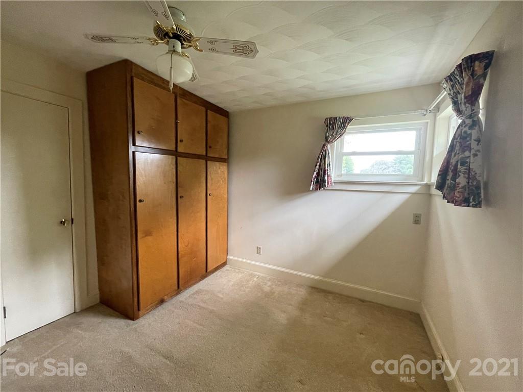 3096 Deal Mill Road Hudson, NC 28638 - Photo 17 of 25 a view of empty room with windows and refrigerator