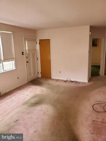 a kitchen with a sink cabinets and a stove top oven