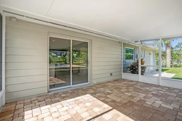 a view of a porch with a bench