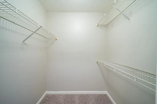 a view of small space with racks on the wall