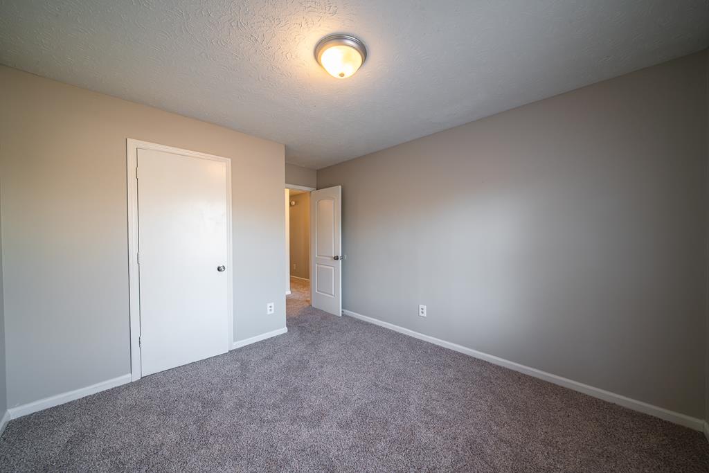 5825 Stafford Lane Columbus, GA 31907 - Photo 27 of 33 a view of an empty room with a window