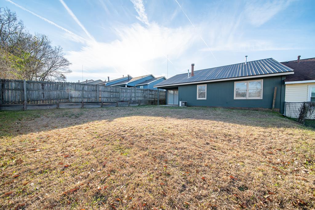 5825 Stafford Lane Columbus, GA 31907 - Photo 32 of 33 a view of a house with a yard
