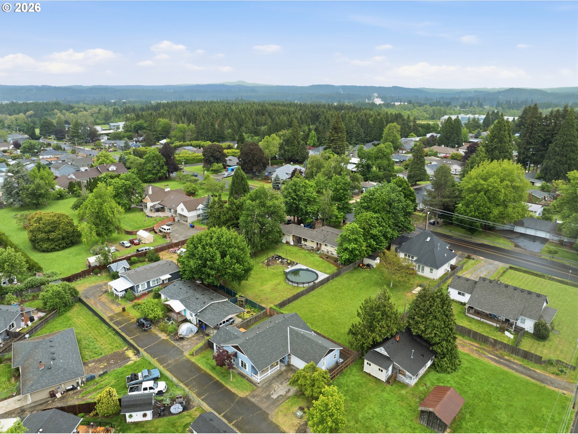 105 Toliver Road Molalla, OR 97038 - Photo 29 of 34 an aerial view of a city with lots of residential buildings