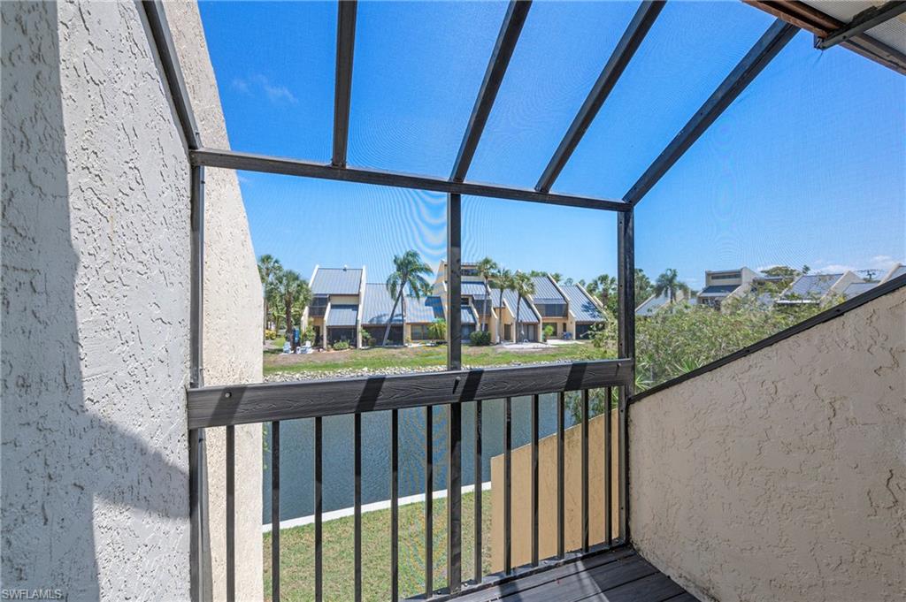 8765 Lateen Lane, Unit 203 Fort Myers, FL 33919 - Photo 16 of 28 a view of a balcony with city view