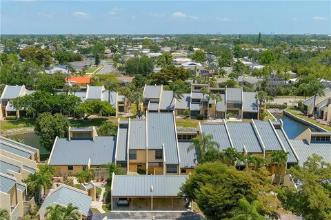 an aerial view of a city with lots of residential buildings