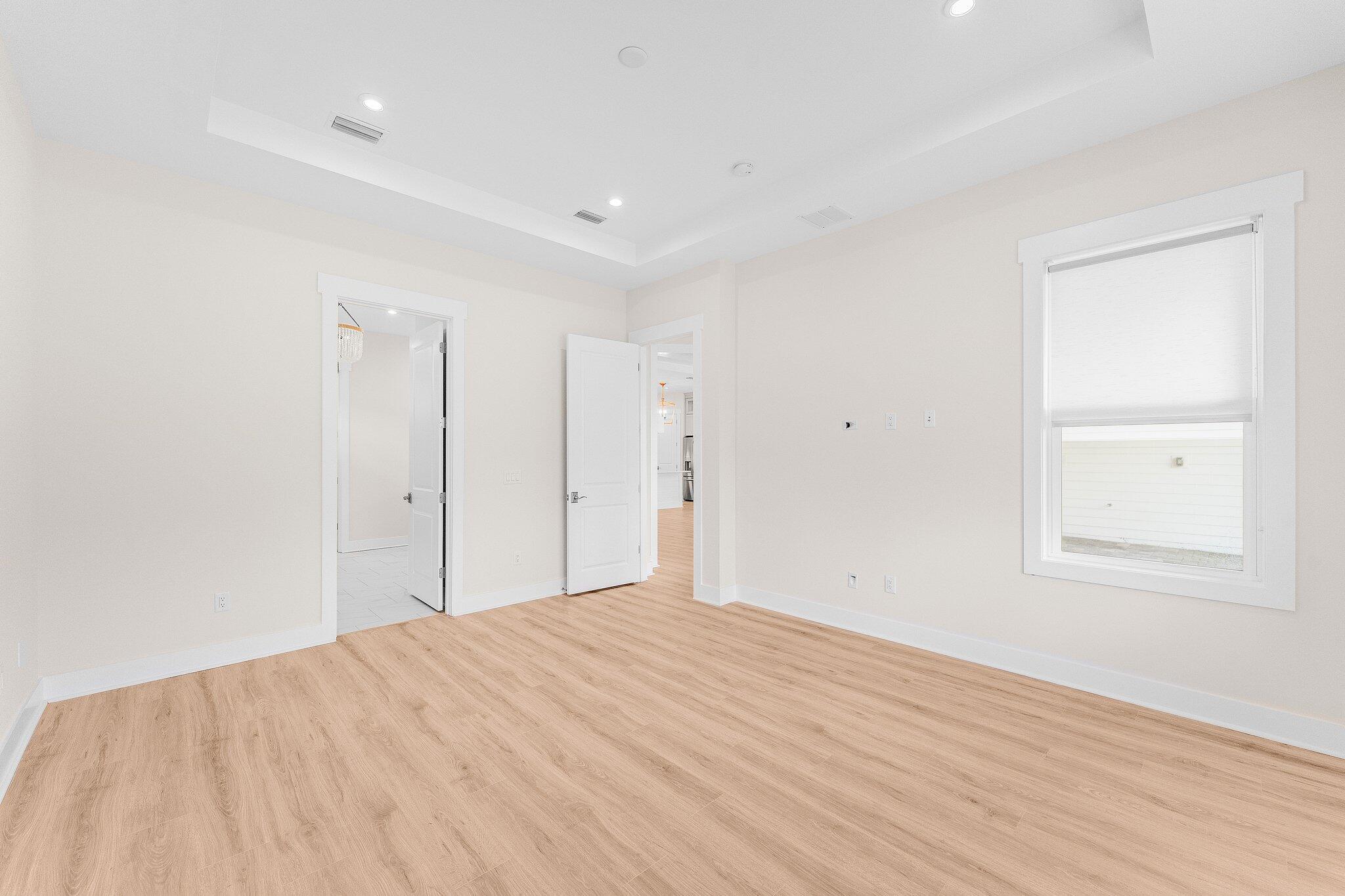 47 Ravine Rd Inlet Beach Inlet Beach, FL 32461 - Photo 30 of 85 a view of empty room with wooden floor and fan