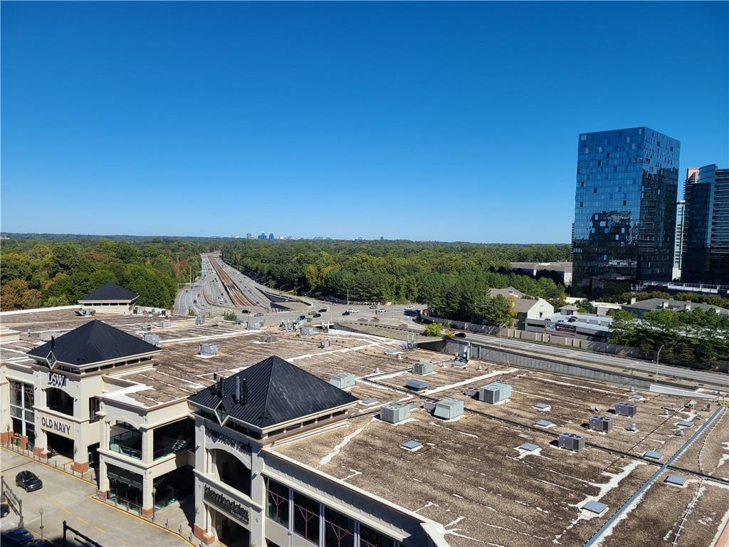 3334 Peachtree Road Northeast, Unit 910 Atlanta, GA 30326 - Photo 16 of 35 a view of city from balcony with seating space