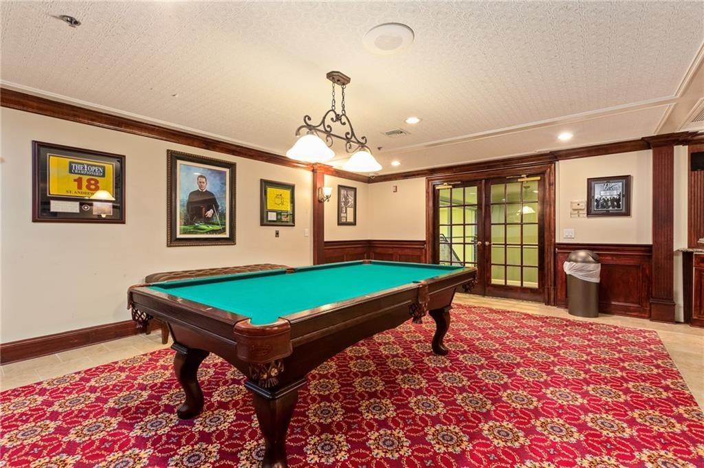 3334 Peachtree Road Northeast, Unit 910 Atlanta, GA 30326 - Photo 25 of 35 a room with pool table and windows