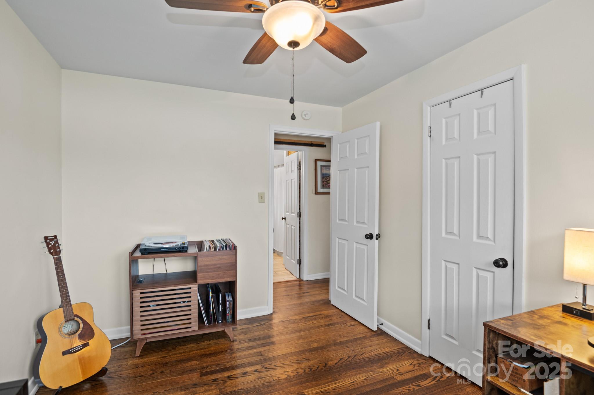 970 West Chapel Road Asheville, NC 28803 - Photo 14 of 19 a view of a hallway with wooden floor and stairs