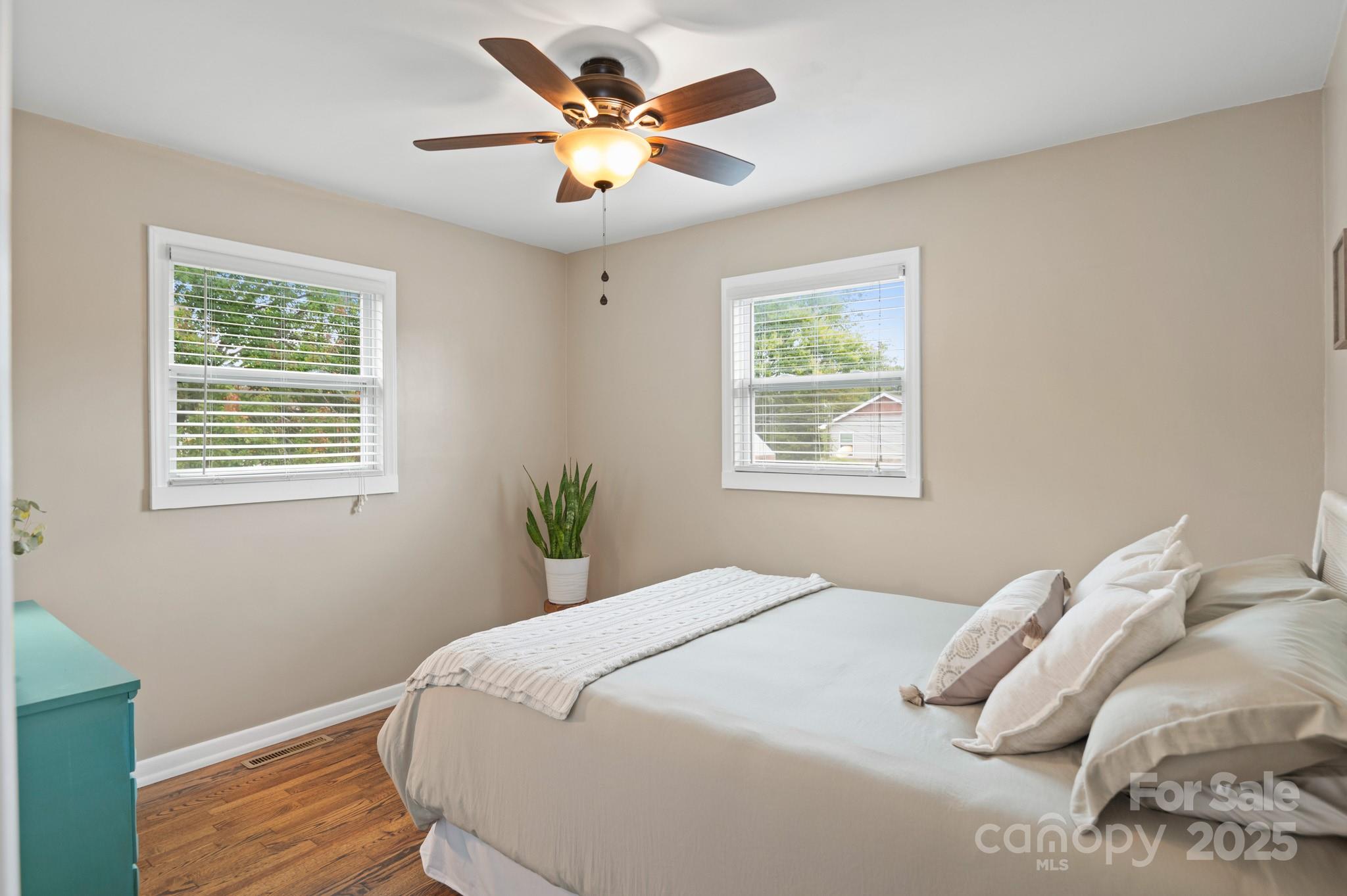 970 West Chapel Road Asheville, NC 28803 - Photo 15 of 19 a bedroom with a bed and a window