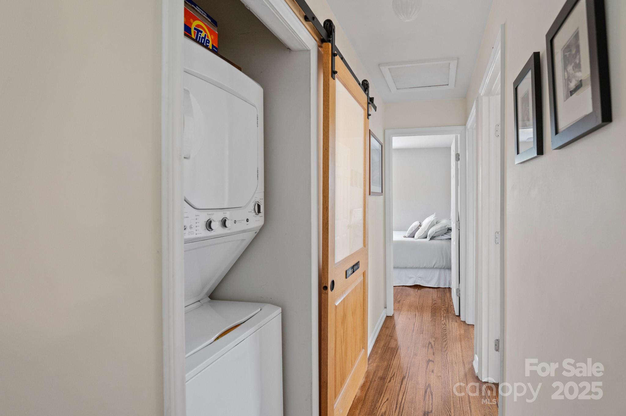 970 West Chapel Road Asheville, NC 28803 - Photo 17 of 19 a view of a hallway with wooden floor and a living room